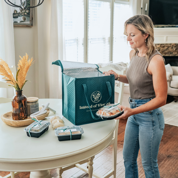 Happy recipient unpacking meal